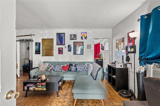 living room featuring parquet flooring