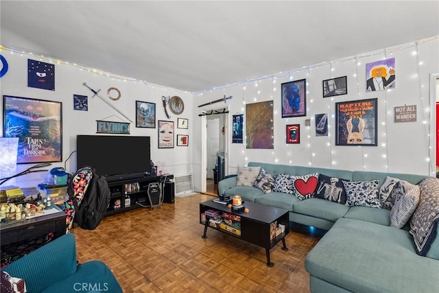 living room with parquet flooring