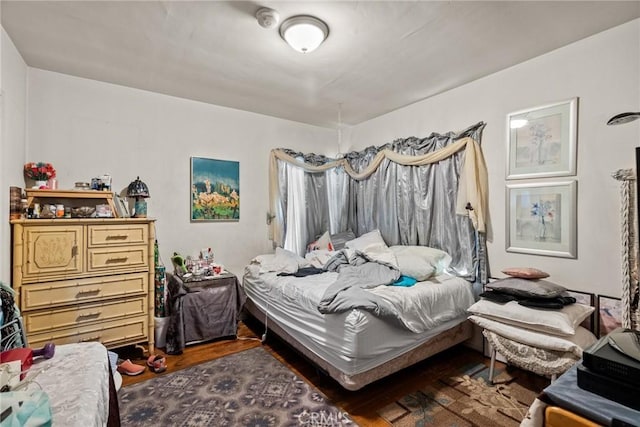 bedroom featuring hardwood / wood-style floors