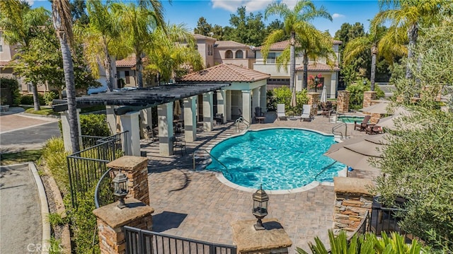 view of swimming pool featuring a patio area