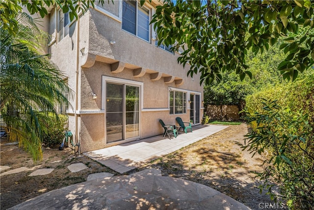 rear view of property with a patio