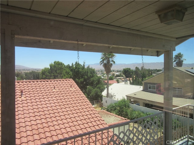 view of patio / terrace featuring a balcony and a mountain view