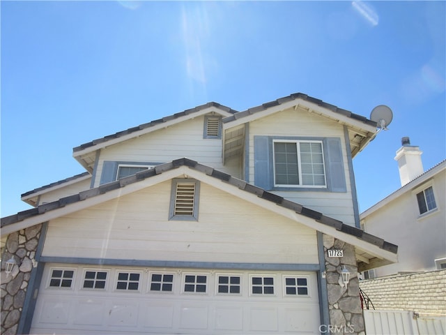 view of front of property featuring a garage