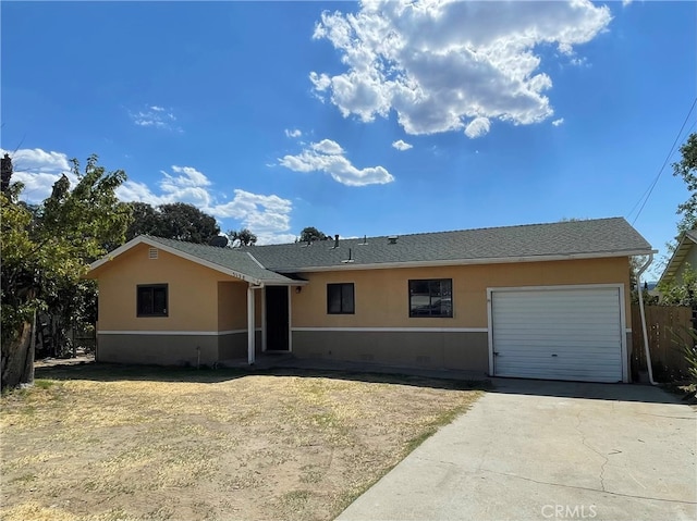 single story home with a garage