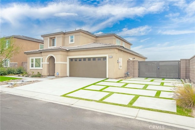 mediterranean / spanish-style house featuring a garage