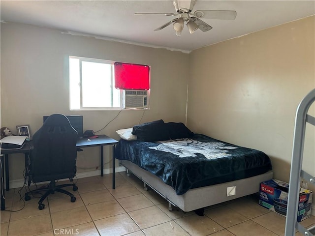 bedroom featuring ceiling fan, light tile patterned floors, and cooling unit