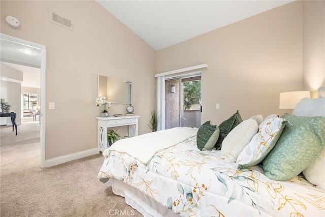 carpeted bedroom featuring high vaulted ceiling and access to exterior