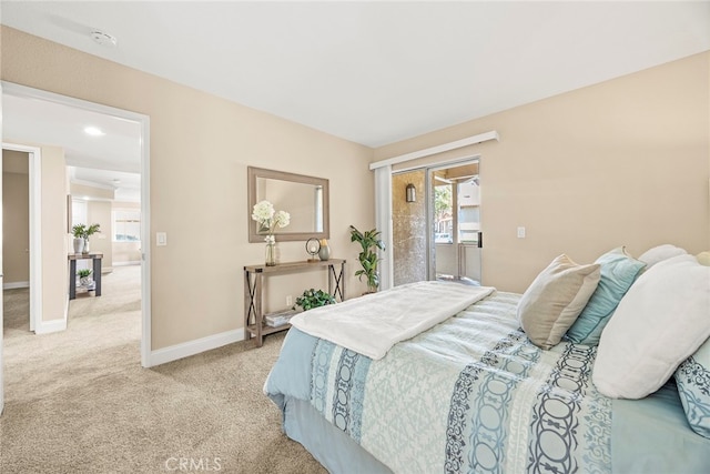 bedroom with light colored carpet