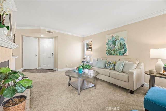 carpeted living room featuring a tiled fireplace and ornamental molding