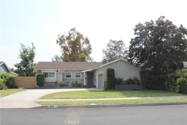 924 Oleander St, Brea, CA 92821 - ranch-style home featuring an attached garage, driveway, and stucco siding