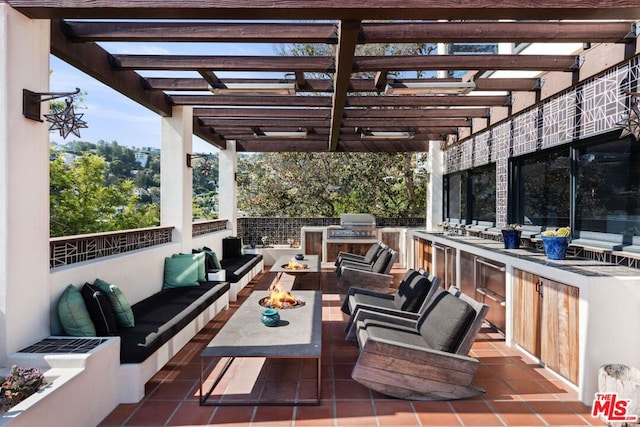 view of patio featuring a grill, an outdoor hangout area, area for grilling, and a pergola