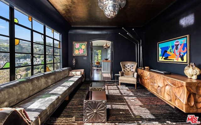 home theater room featuring a chandelier