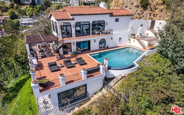 view of pool with a patio area