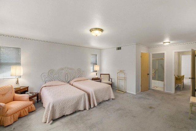 bedroom with light colored carpet