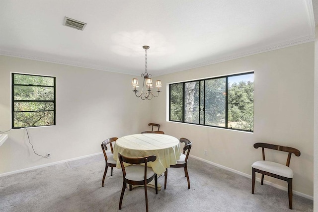 dining space with light carpet and a notable chandelier