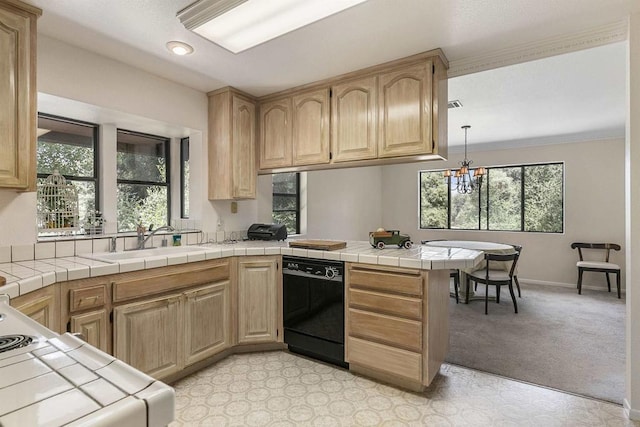 kitchen with sink, tile countertops, kitchen peninsula, and black dishwasher