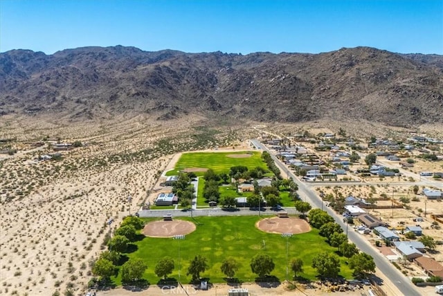 6818 El Sol Ave Unit 29, Palms, CA 92277 - aerial view of residential area with mountains