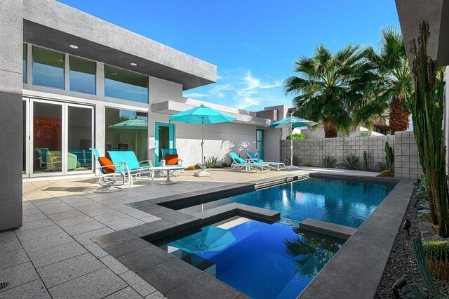 view of pool with a patio