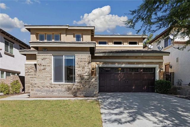 prairie-style house featuring a garage