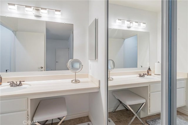 full bath featuring tile patterned flooring and vanity