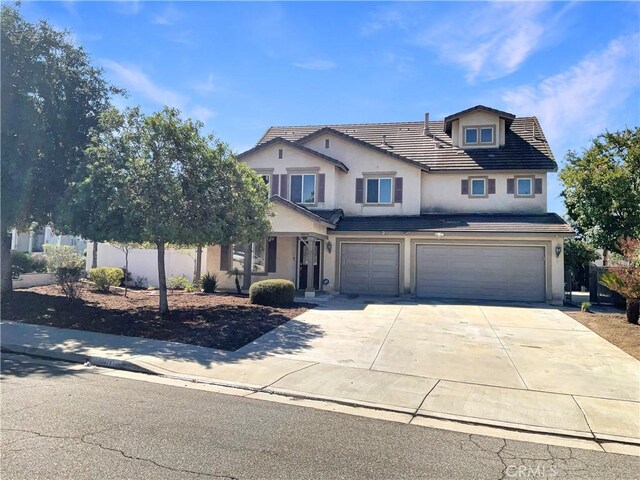 view of property featuring a garage