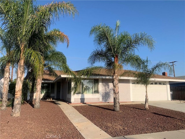 single story home featuring a garage