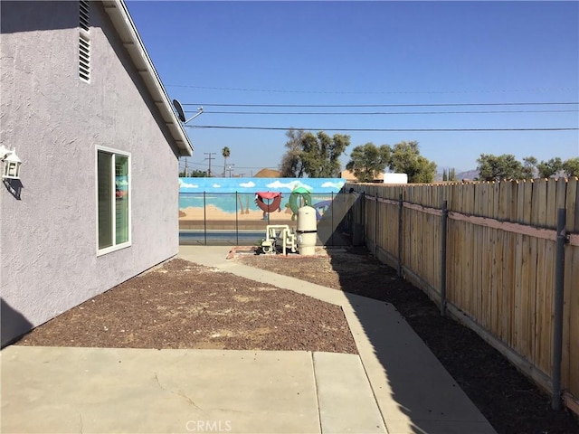 view of yard with a patio area