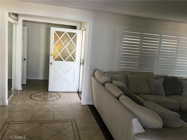 living room featuring light tile patterned flooring