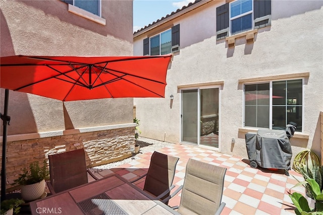 view of patio / terrace featuring a grill