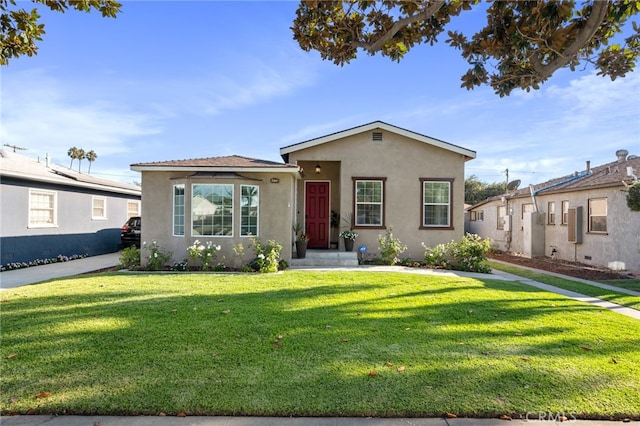 view of front of house with a front yard