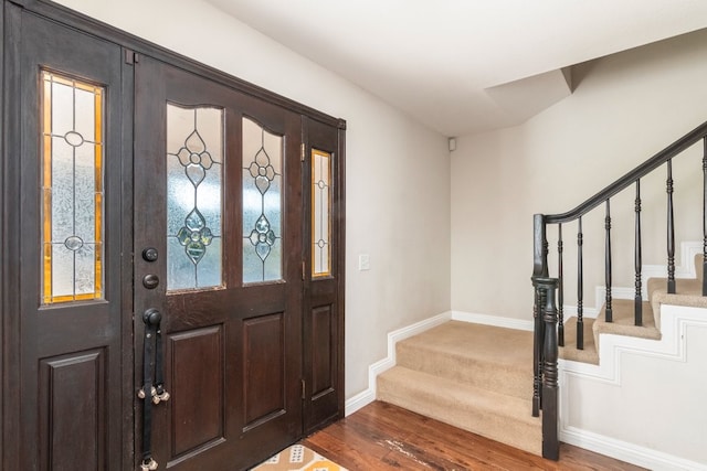 entrance foyer with dark wood-type flooring