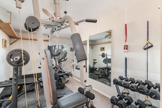 workout area with a textured ceiling