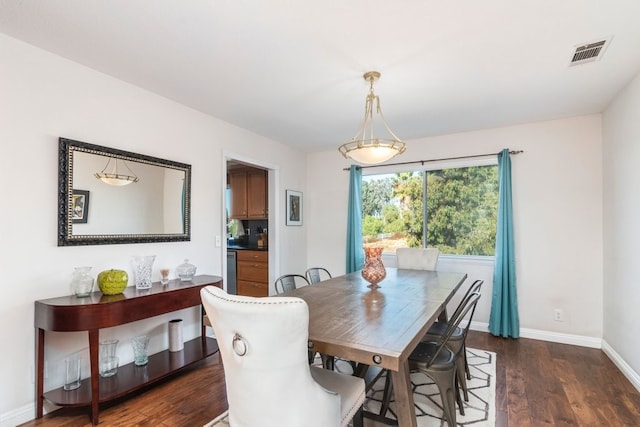 dining room featuring dark hardwood / wood-style floors