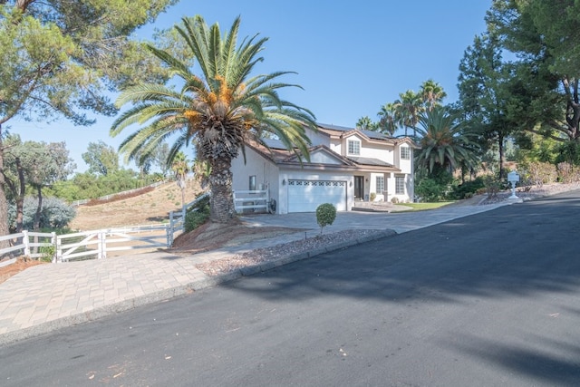 view of front of home with a garage