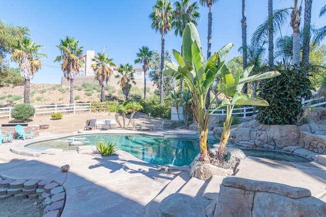 view of swimming pool featuring a patio area