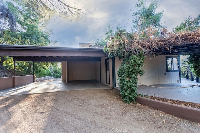 view of front of house featuring a carport