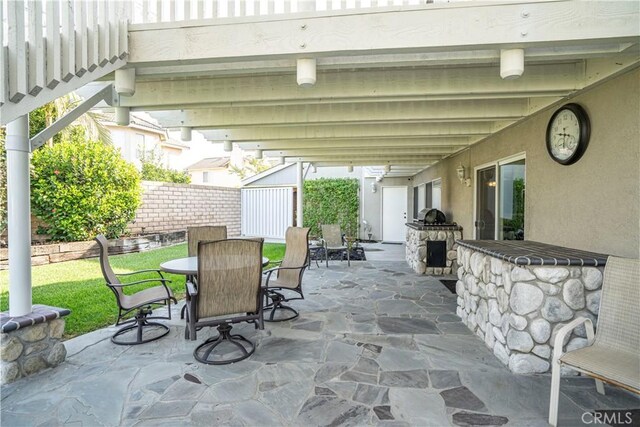 view of patio with a shed