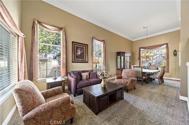 carpeted living room featuring crown molding and plenty of natural light