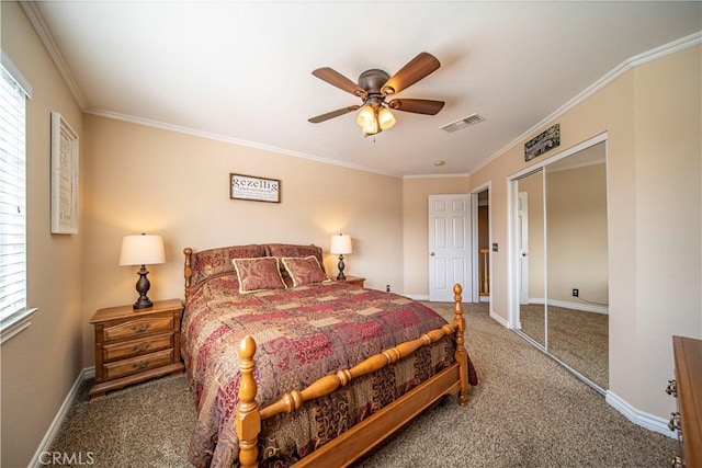 bedroom with a closet, ceiling fan, carpet flooring, and crown molding