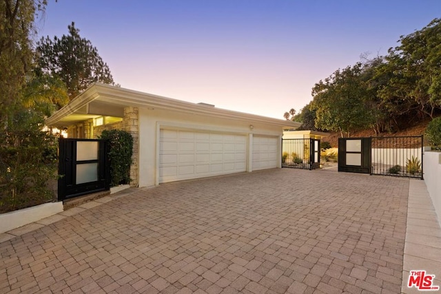 view of front of property featuring a garage