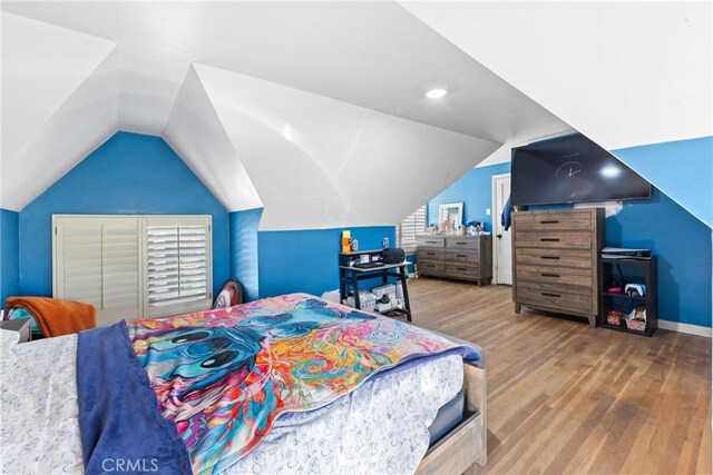 41695 Mayberry Ave, Hemet, CA 92544 - bedroom featuring wood finished floors, vaulted ceiling, and baseboards