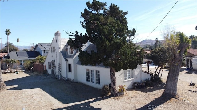 view of home's exterior with solar panels