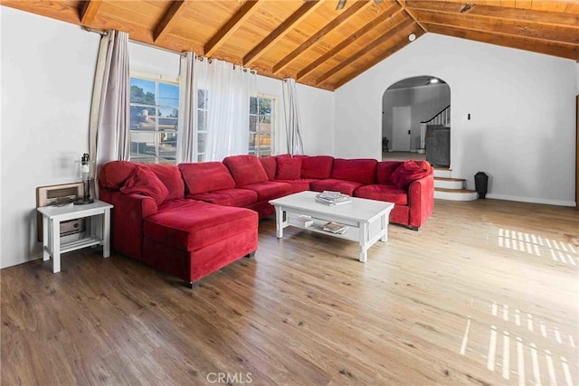 41695 Mayberry Ave, Hemet, CA 92544 - living room with arched walkways, wood finished floors, wooden ceiling, baseboards, and stairs
