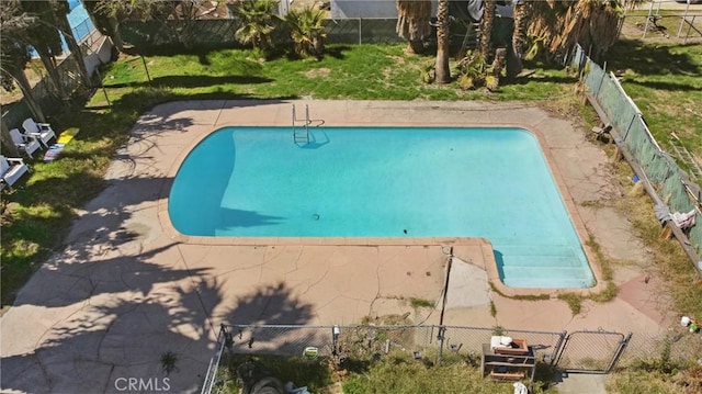 view of pool featuring a fenced in pool, a patio, and fence private yard