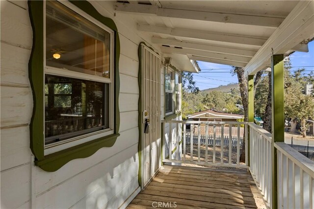 wooden deck featuring a porch