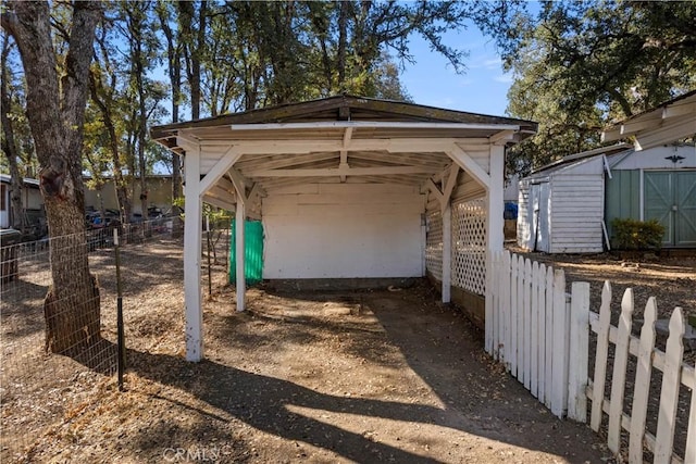 exterior space featuring a carport