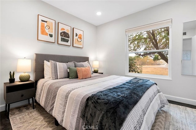 bedroom featuring hardwood / wood-style flooring