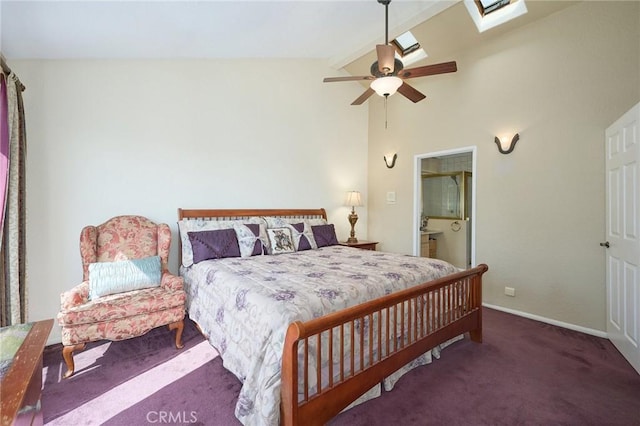 carpeted bedroom with high vaulted ceiling, a skylight, ensuite bath, and ceiling fan