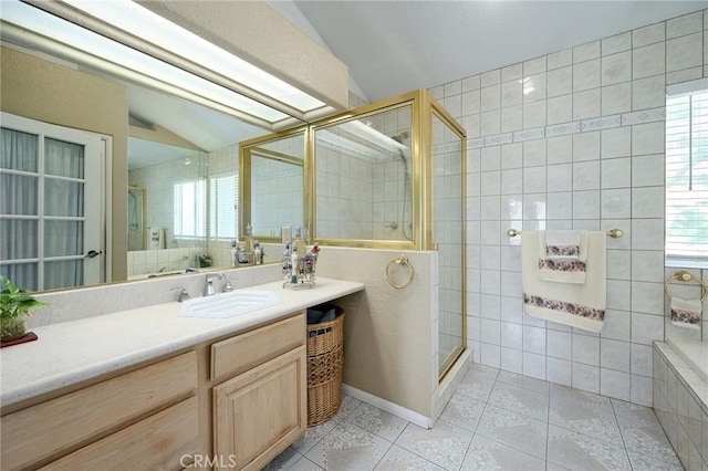 bathroom with tile patterned floors, vaulted ceiling, an enclosed shower, and a healthy amount of sunlight