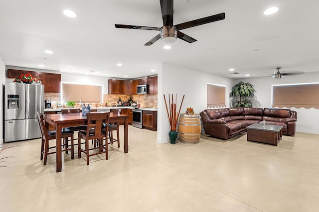 dining area featuring ceiling fan